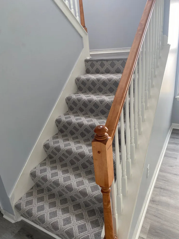 Stairs with vinyl plank and carpet by JCB Interiors LLC - Photo 8