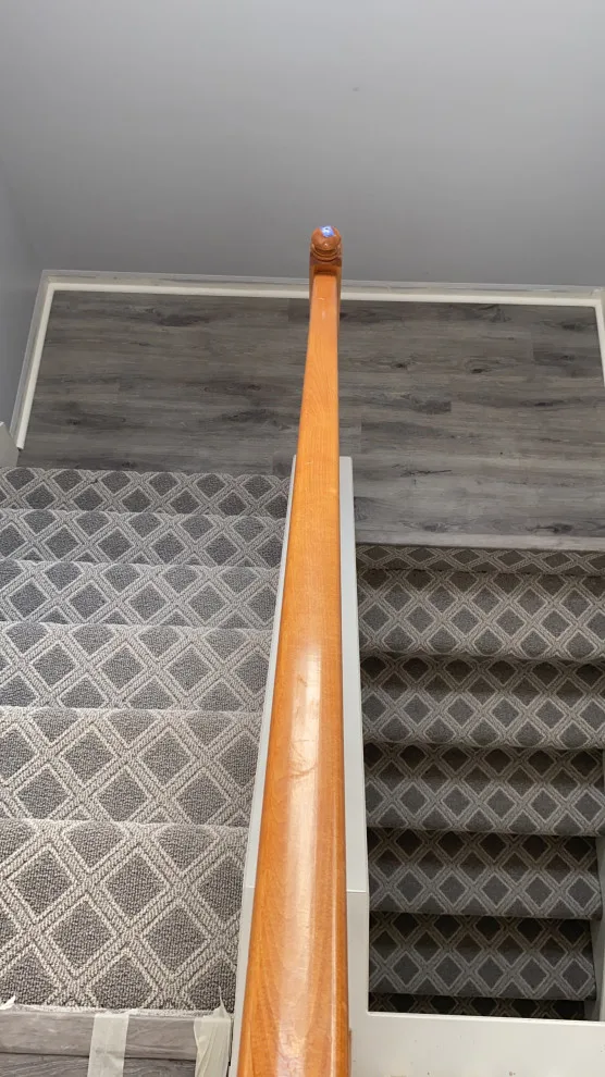 Stairs with vinyl plank and carpet by JCB Interiors LLC - Photo 5