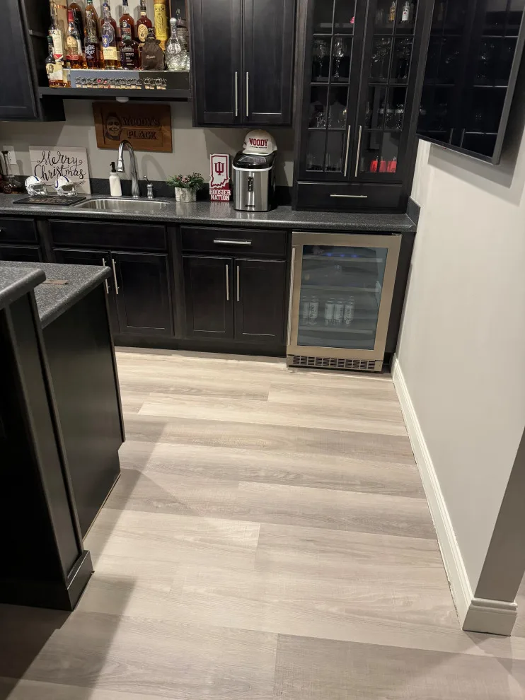 Moore’s LVP Flooring Renovation by Homanvestments LLC & Extreme Custom Construction - Photo 3
