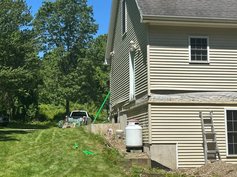 Enclosed wraparound porch by Bolton Home Remodelers - Photo 11