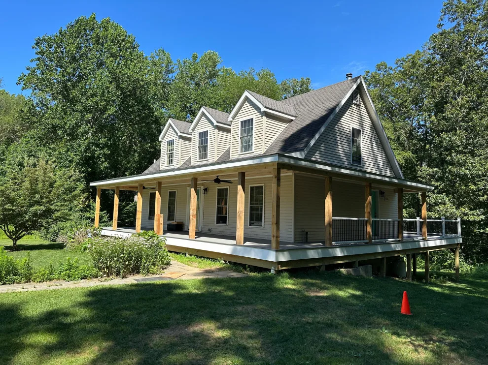 Enclosed wraparound porch by Bolton Home Remodelers - Photo 3
