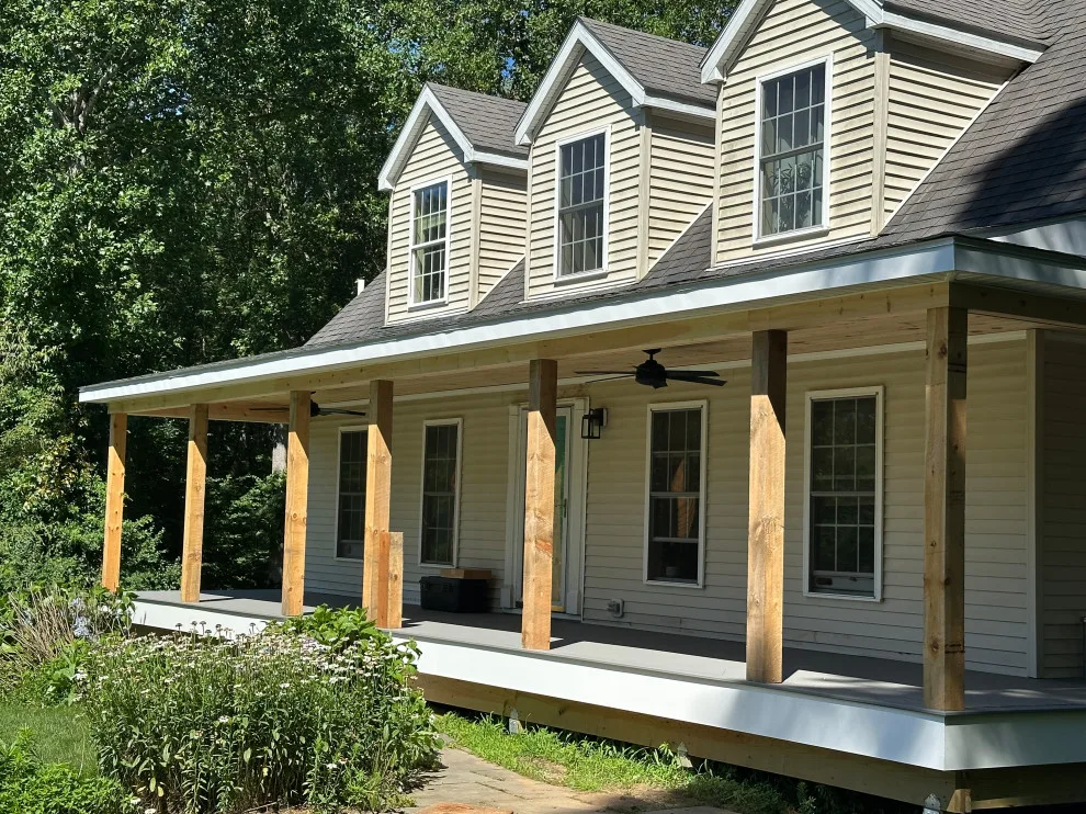 Enclosed wraparound porch by Bolton Home Remodelers - Photo 6