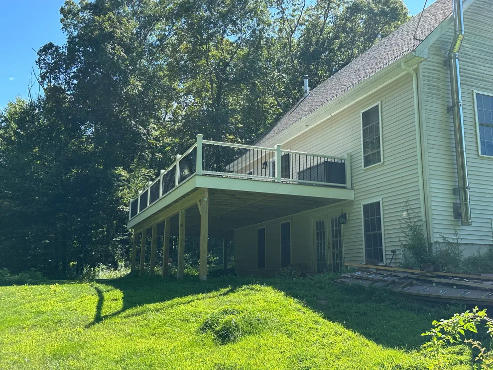 Enclosed wraparound porch by Bolton Home Remodelers - Photo 7