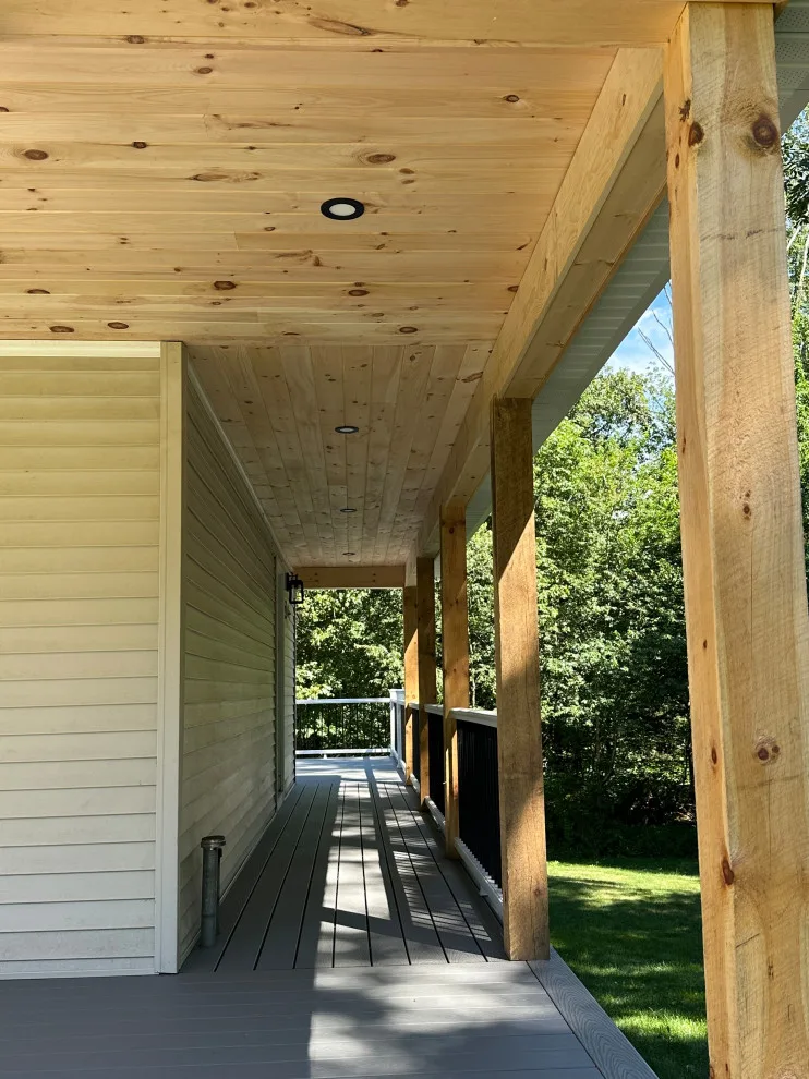 Enclosed wraparound porch by Bolton Home Remodelers - Photo 9
