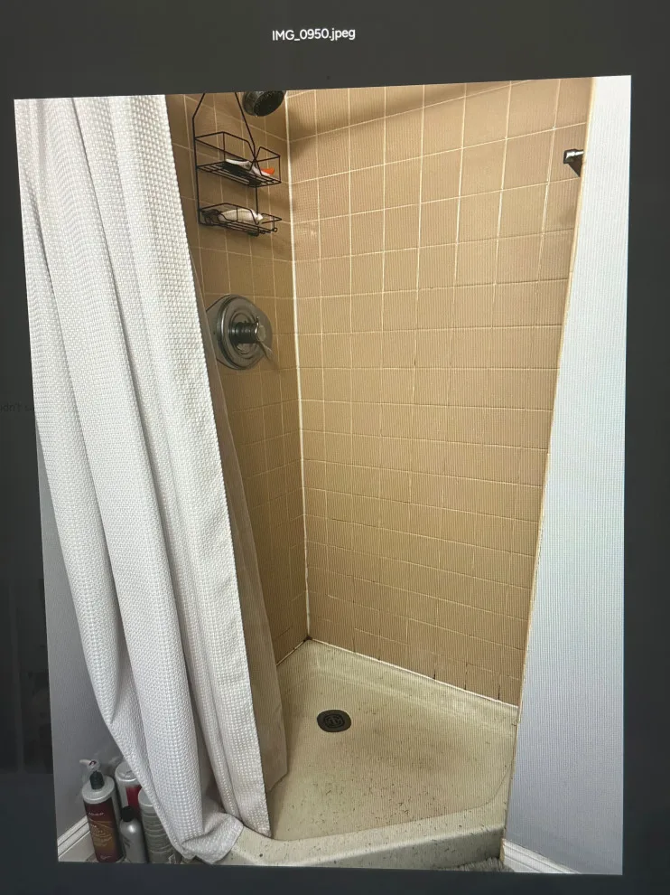 Compact master bathroom makeover featuring a bespoke tile shower and custom glass enclosure by Bolton Home Remodelers - Photo 3