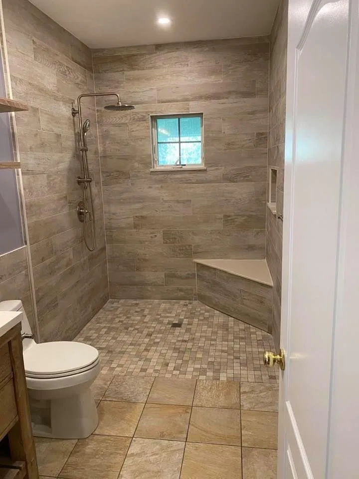 Shower with a step-in design by Hourglass Home Improvements Inc. - Photo 3