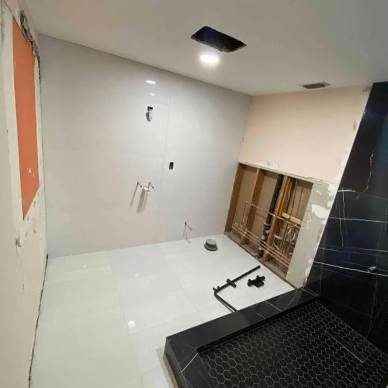 Bathroom Remodel Transformation by Craftsman Construction - Photo 3