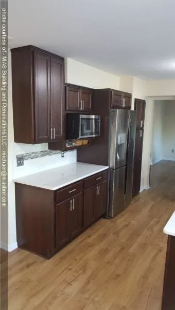Jois Kitchen and Fireplace Revamp by MAS Building And Renovations - Photo 8