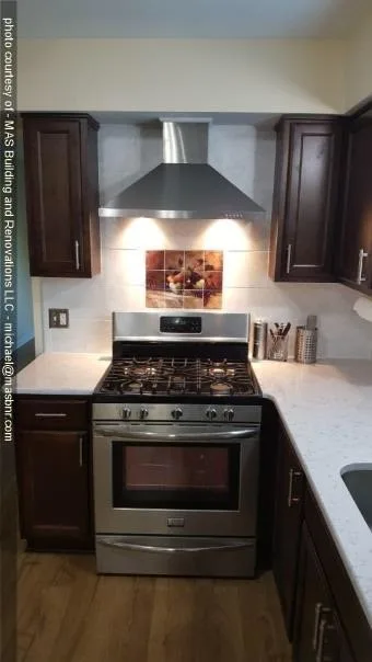 Jois Kitchen and Fireplace Revamp by MAS Building And Renovations - Photo 9