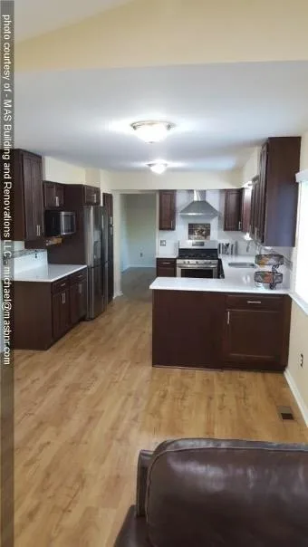 Jois Kitchen and Fireplace Revamp by MAS Building And Renovations - Photo 11