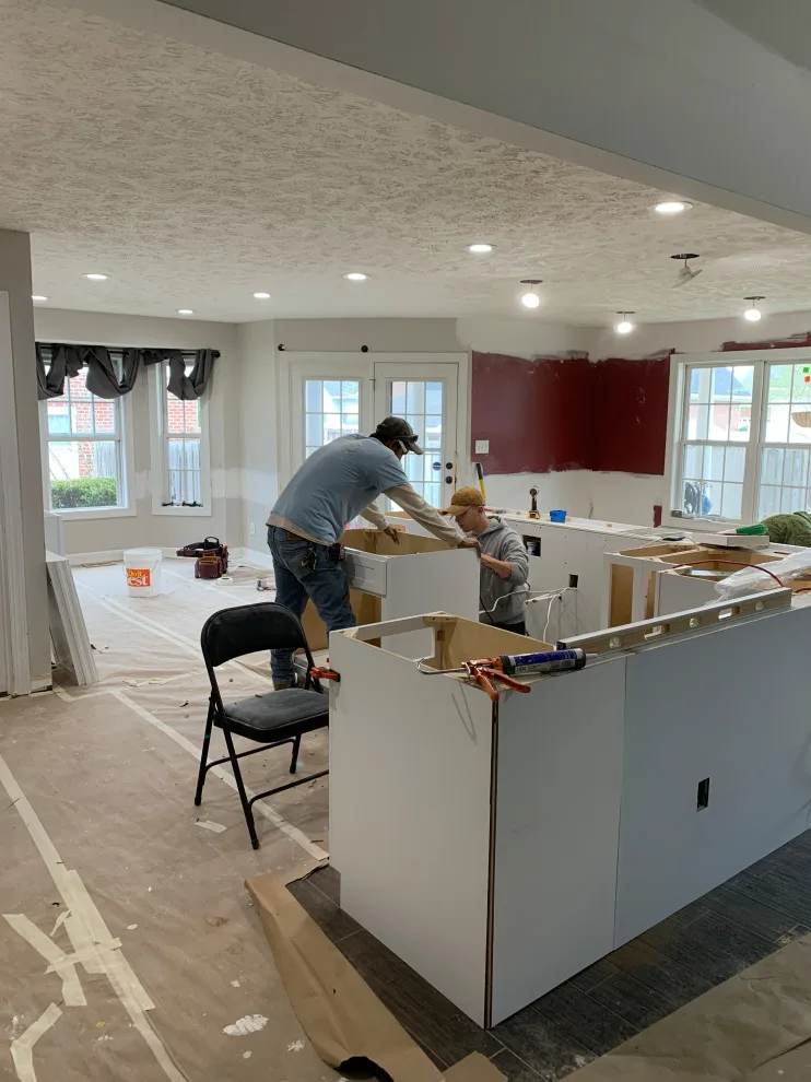 Kitchen Expansion with Dual-Sided Fireplace, Lighting, and Flooring by Riverstone Construction And Home Improvement - Photo 10