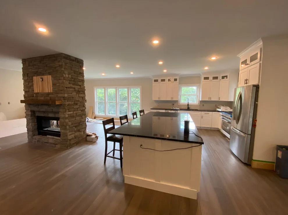 Kitchen Expansion with Dual-Sided Fireplace, Lighting, and Flooring by Riverstone Construction And Home Improvement - Photo 6