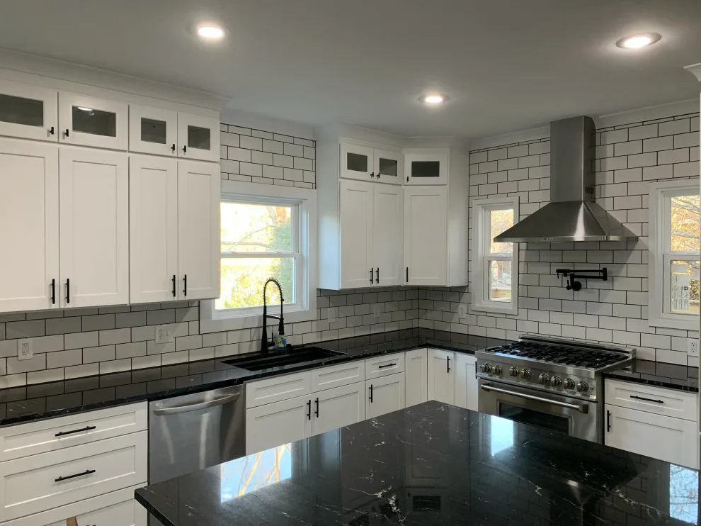 Kitchen Expansion with Dual-Sided Fireplace, Lighting, and Flooring by Riverstone Construction And Home Improvement - Photo 14