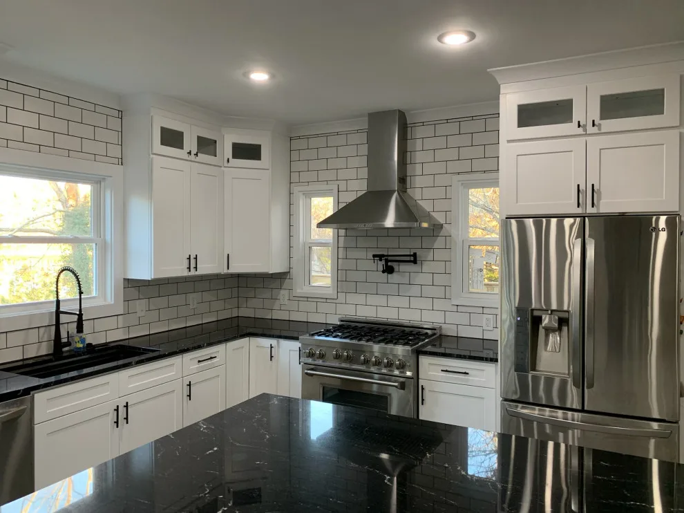 Kitchen Expansion with Dual-Sided Fireplace, Lighting, and Flooring by Riverstone Construction And Home Improvement - Photo 4