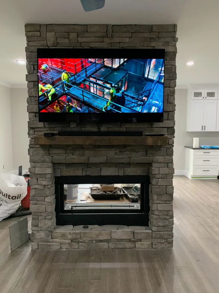 Kitchen Expansion with Dual-Sided Fireplace, Lighting, and Flooring by Riverstone Construction And Home Improvement - Photo 2