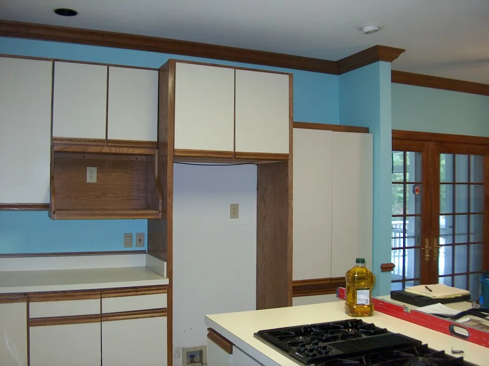 Kraftmaid kitchen with Netuno Bordeaux countertops by A.M.Carter Construction Inc - Photo 7