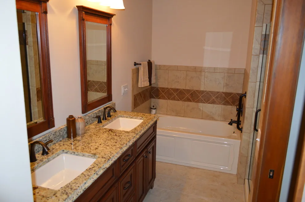 Primary and Secondary Bathroom Renovation by Twin Lakes Woodworking & Remodeling - Photo 4