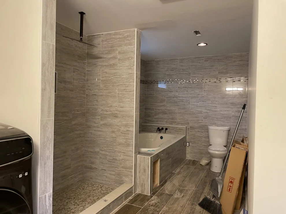 Primary Bathroom with Laundry by JV Custom Construction LLC - Photo 2