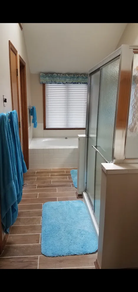 Amber Primary Bathroom by Eveland Construction Co. - Photo 2