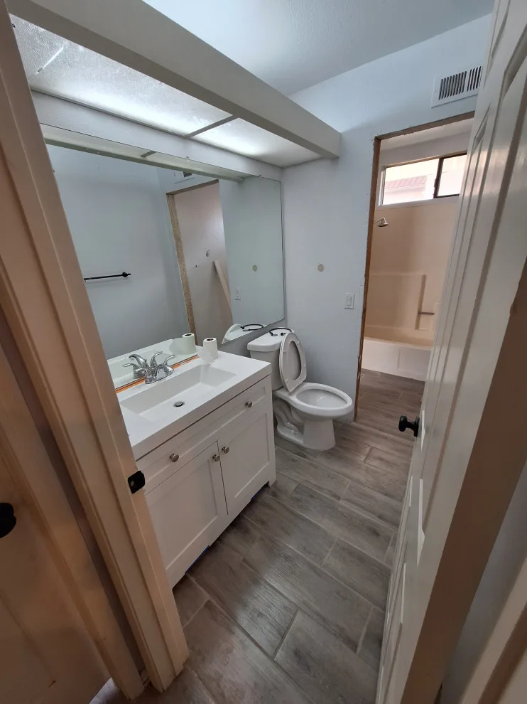 Bathroom Renovation: Tiles and Paint by Rigos Painting Services - Photo 10