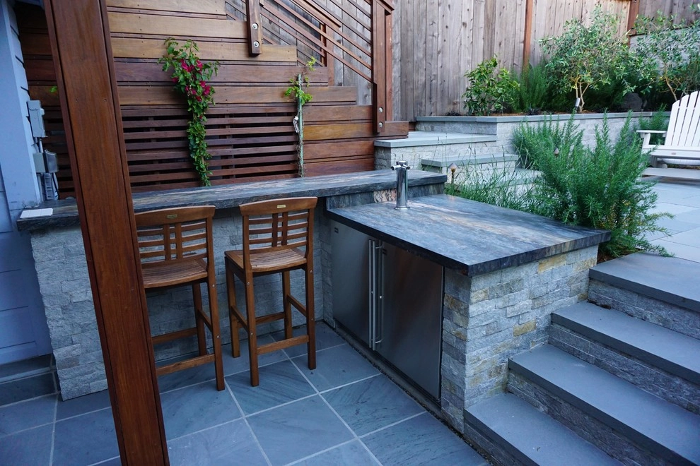 Small Yard with Outdoor Kitchen by T.H.Norton Landscape Architecture, Inc. - Photo 4