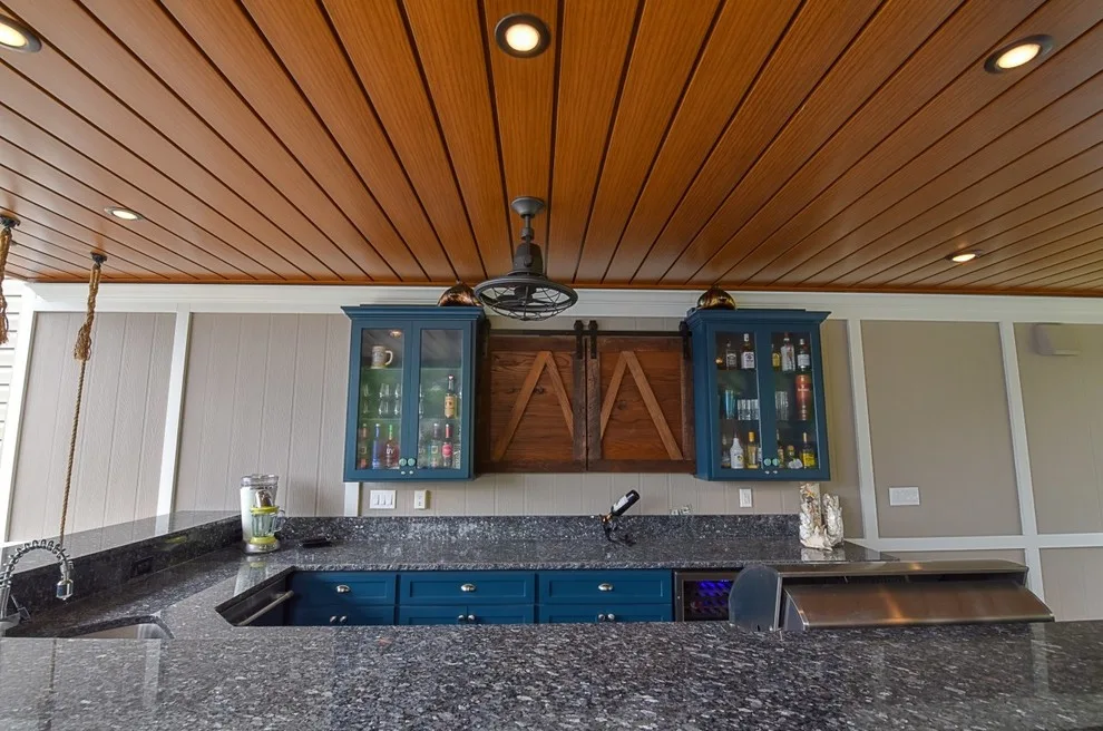 Outdoor Living Covered Patio by Jackson Custom Homes & Remodeling - Photo 18