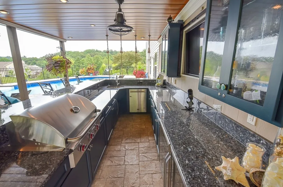 Outdoor Living Covered Patio by Jackson Custom Homes & Remodeling - Photo 8