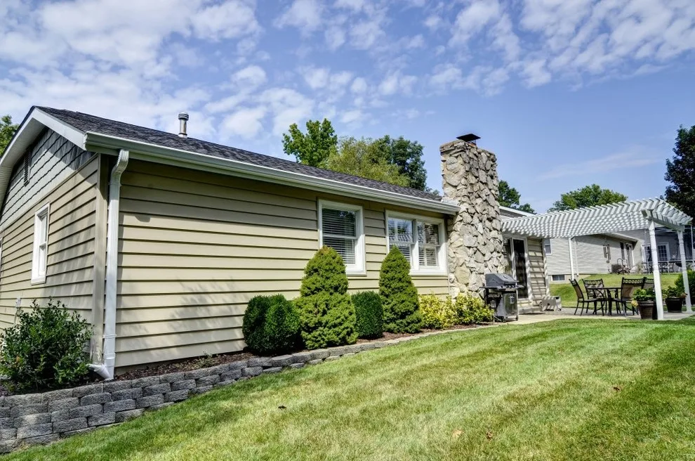 Exterior Siding Transformation by Jackson Custom Homes & Remodeling - Photo 5