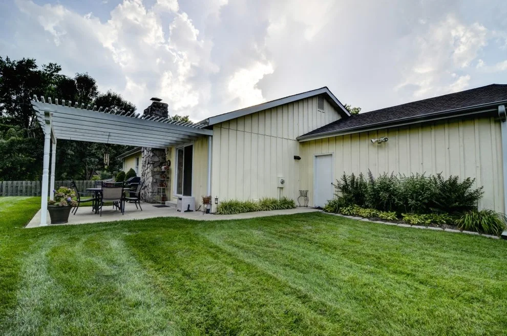Exterior Siding Transformation by Jackson Custom Homes & Remodeling - Photo 11