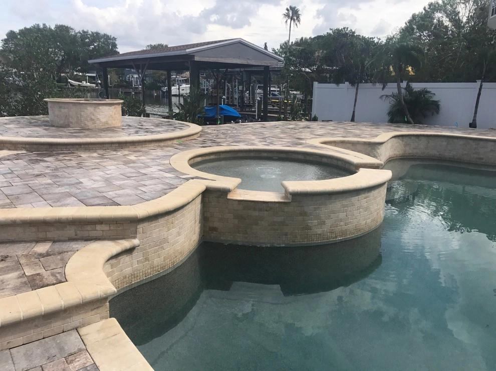 Pool Renovation, Patio, Driveway and Fire pit by Terranova Landscapes & Designs Inc. - Photo 5