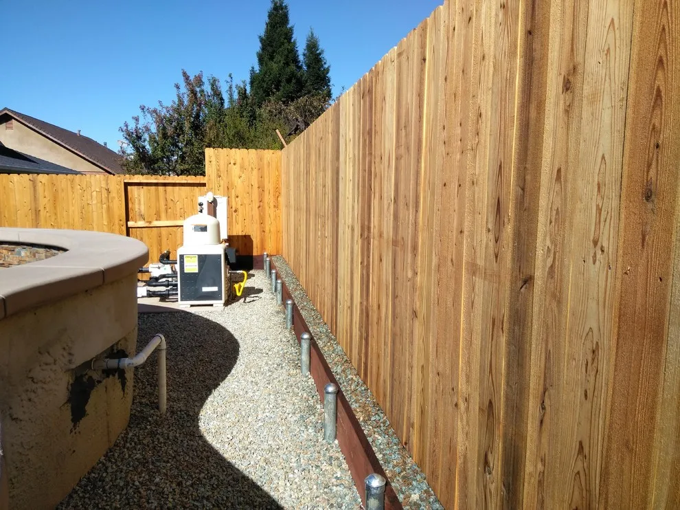 Three Rail Dog-Eared Neighbor-Friendly Barrier by Cox Fencing - Photo 6