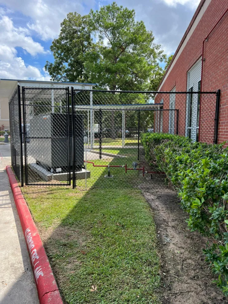Dark Chain Link Barrier and Entrance by My Garage And Gates - Photo 2