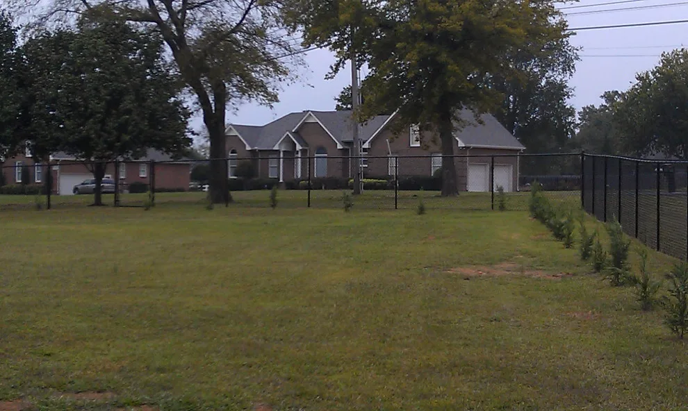Vinyl-Coated Black Chain Link Fence by A-1 Fence & Deck Company - Photo 9