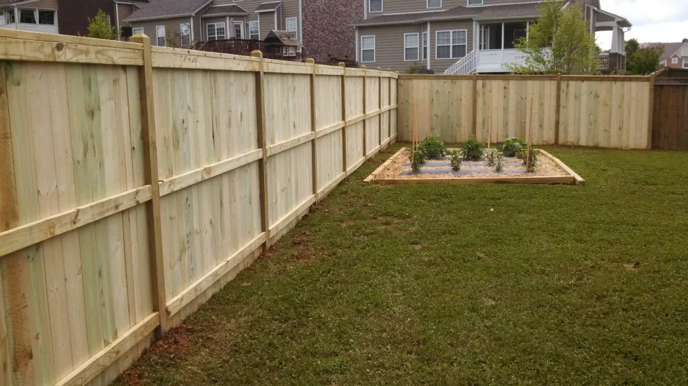 Raised Posts Fence with Cap and Trim by A-1 Fence & Deck Company - Photo 9