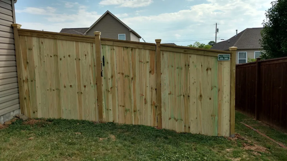 Raised Posts Fence with Cap and Trim by A-1 Fence & Deck Company - Photo 10
