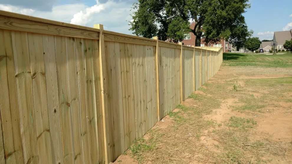 Raised Posts Fence with Cap and Trim by A-1 Fence & Deck Company - Photo 6