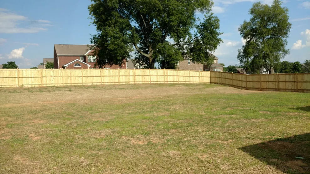 Raised Posts Fence with Cap and Trim by A-1 Fence & Deck Company - Photo 19