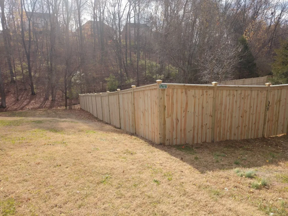 Raised Posts Fence with Cap and Trim by A-1 Fence & Deck Company - Photo 12