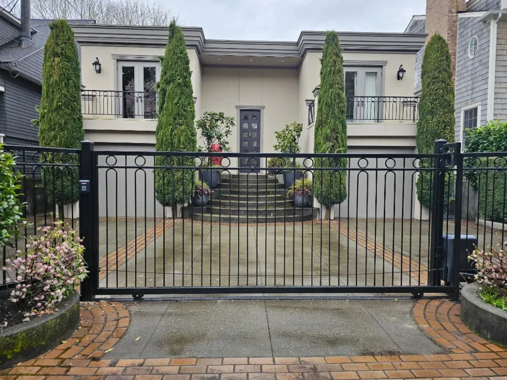Tailored sliding gate with coordinating rails in Seattle, WA by Evergreen Electric Gates NW LLC - Photo 2