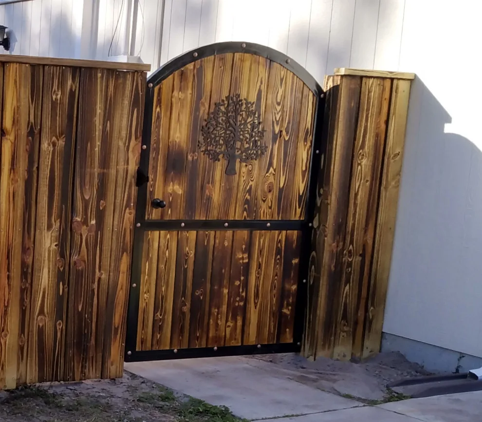 Custom Decorative Gate with Concealed Vehicle Access Completed by Hunter's Woods Outdoors - Photo 3