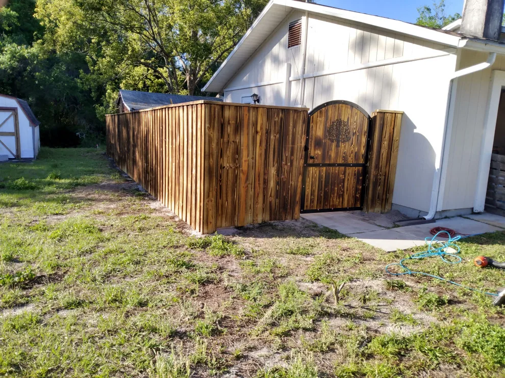 Custom Decorative Gate with Concealed Vehicle Access Completed by Hunter's Woods Outdoors - Photo 2