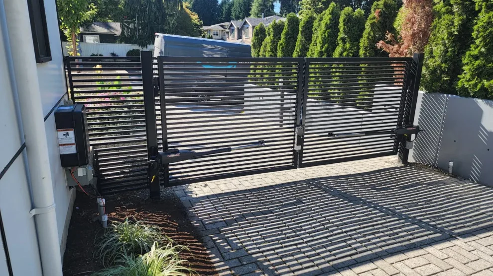 Contemporary dual swing gate setup in Kirkland, WA by Evergreen Electric Gates NW LLC - Photo 3