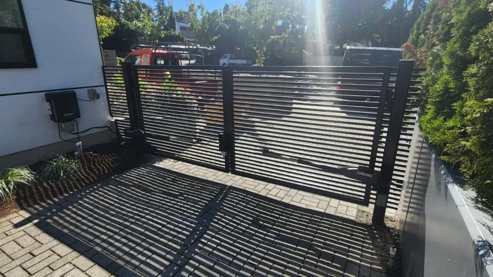 Contemporary dual swing gate setup in Kirkland, WA by Evergreen Electric Gates NW LLC - Photo 2