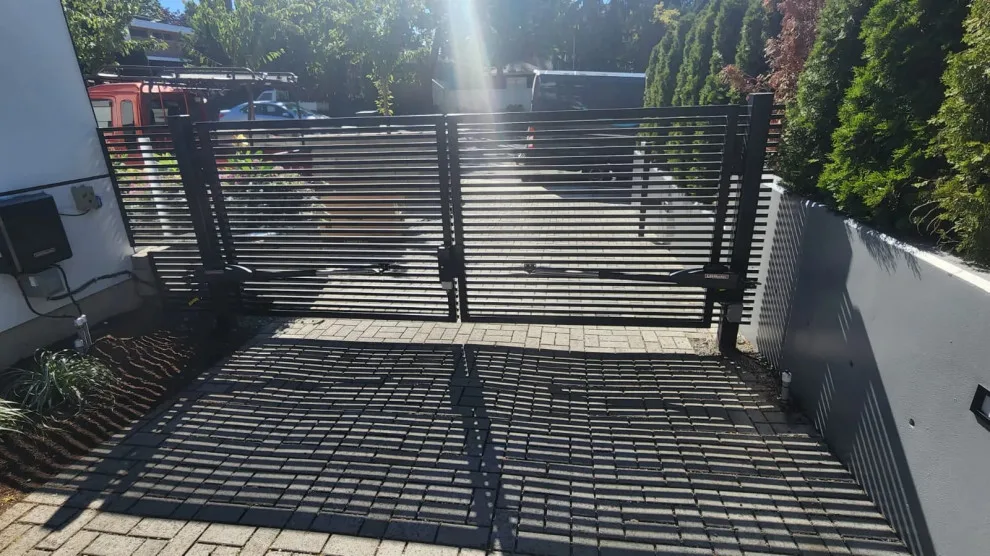 Contemporary dual swing gate setup in Kirkland, WA by Evergreen Electric Gates NW LLC - Photo 4