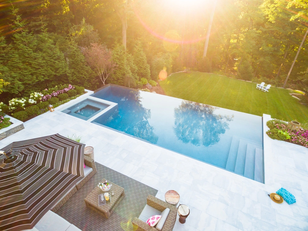 Vanishing edge swimming pool by Thomas Flint Landscape Design & Development - Photo 16