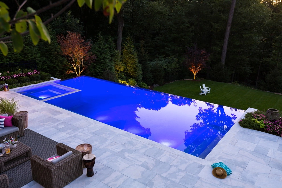 Vanishing edge swimming pool by Thomas Flint Landscape Design & Development - Photo 21