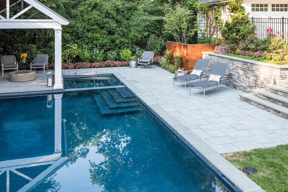 beautiful swimming pool blended seamlessly into the landscape by Thomas Flint Landscape Design & Development - Photo 3