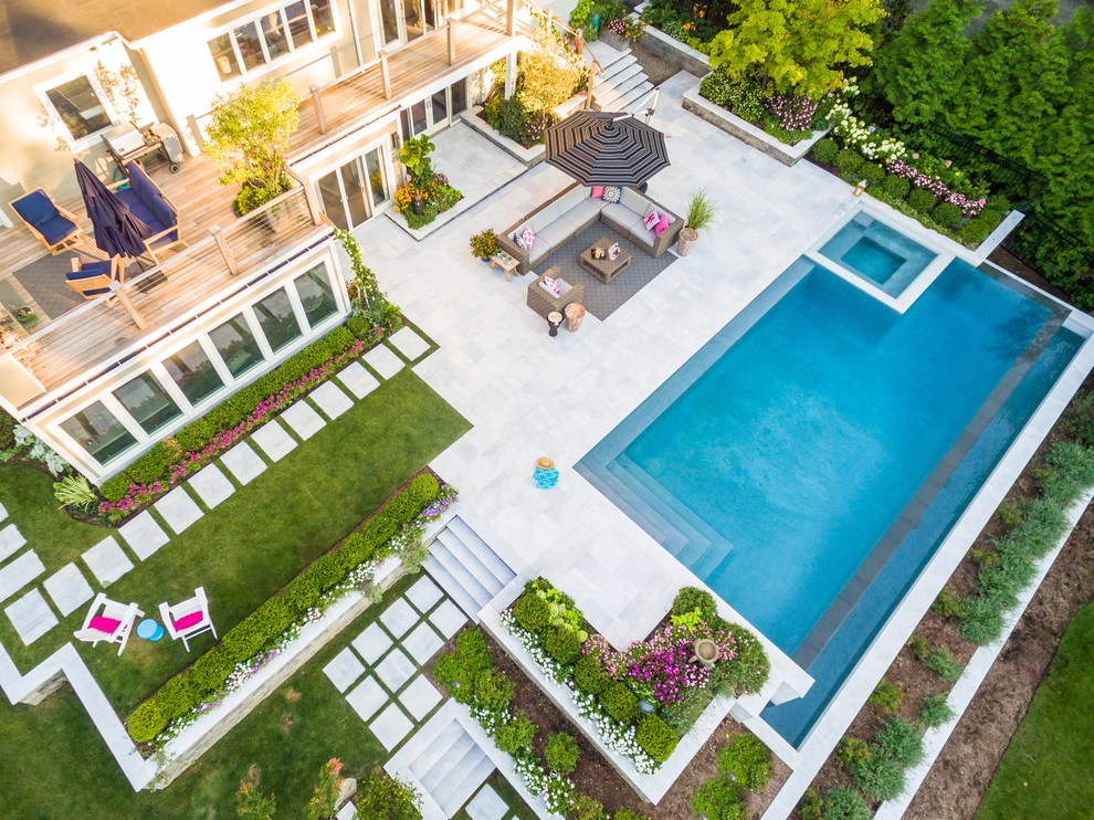 Vanishing edge swimming pool by Thomas Flint Landscape Design & Development - Photo 10