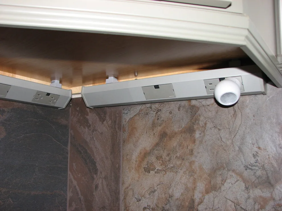 Legrand under-counter lighting and outlets without backsplash cuts by Annette McCleery Building Design - Photo 2