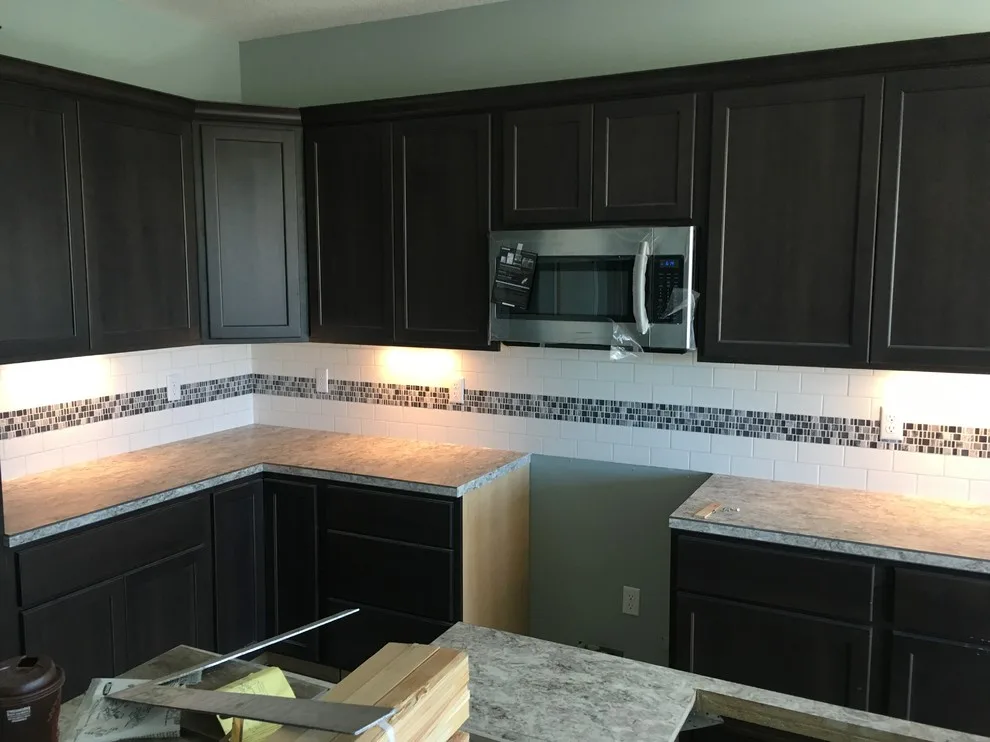 New Home Construction Transition | Cabinetry, Backsplash, and Countertops by DunRight Construction LLC - Photo 2